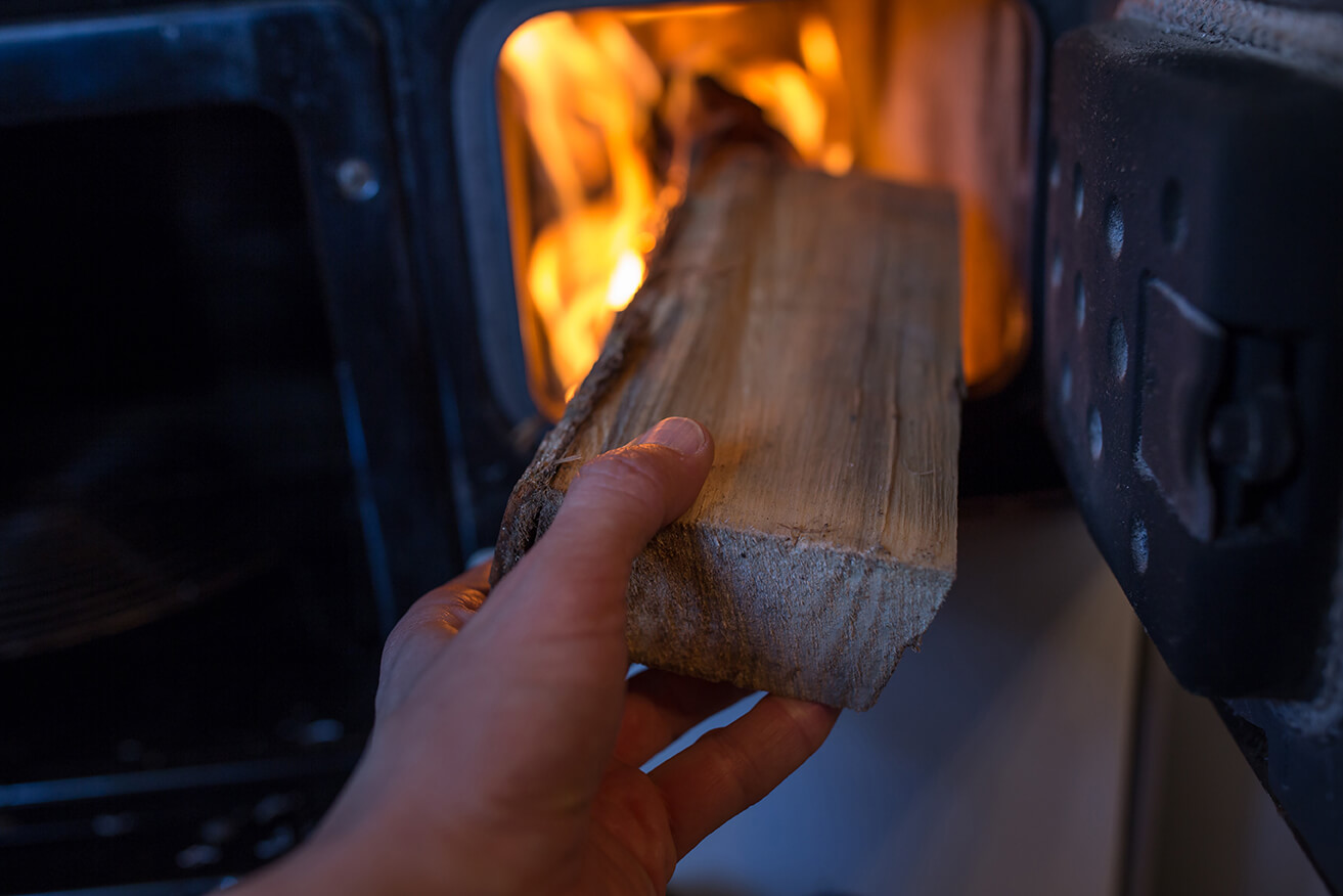 Senk varmekostnadene med peisen